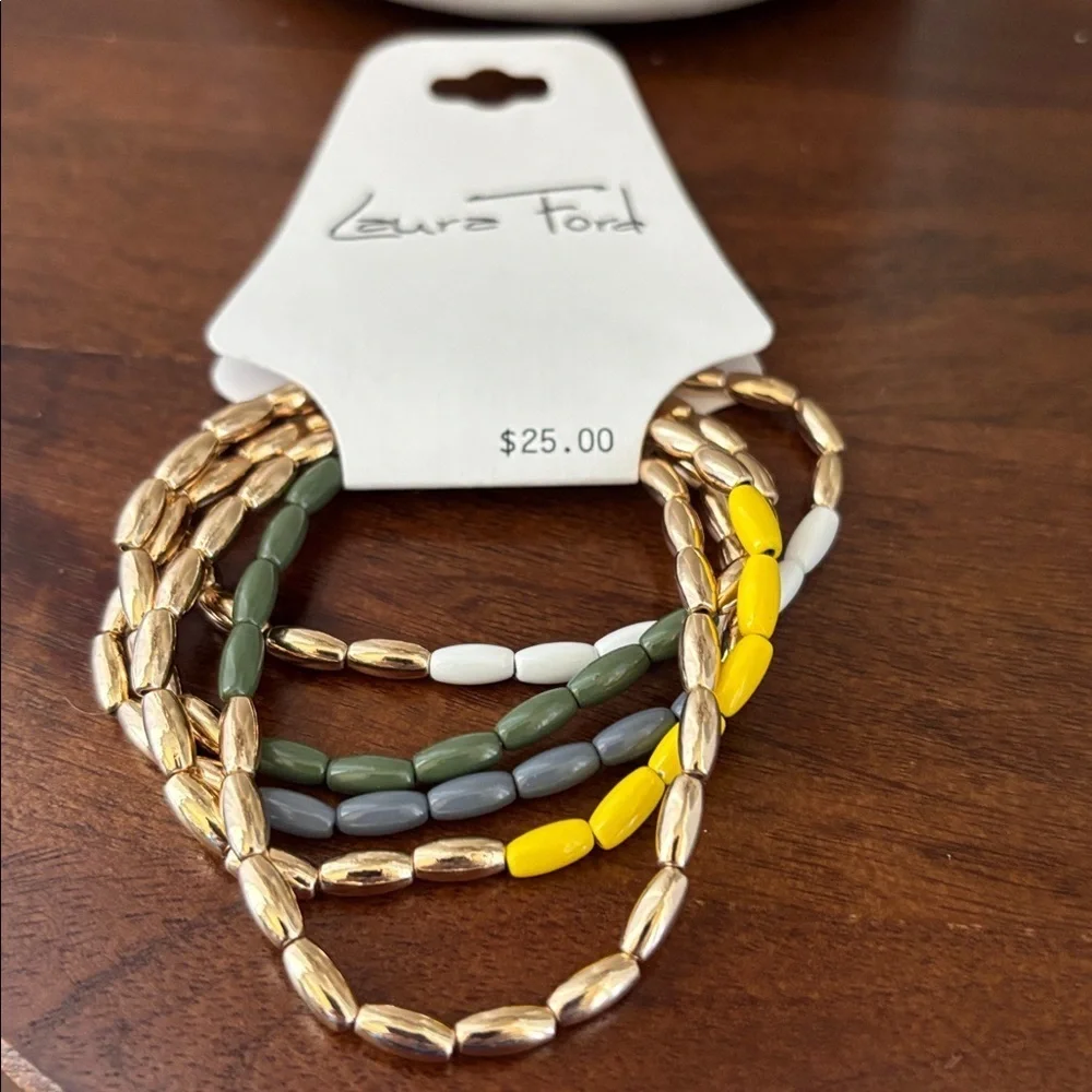 Laura Ford Goldtone 5 Row Rice bead yellow,green, blues & white,chunky stretch